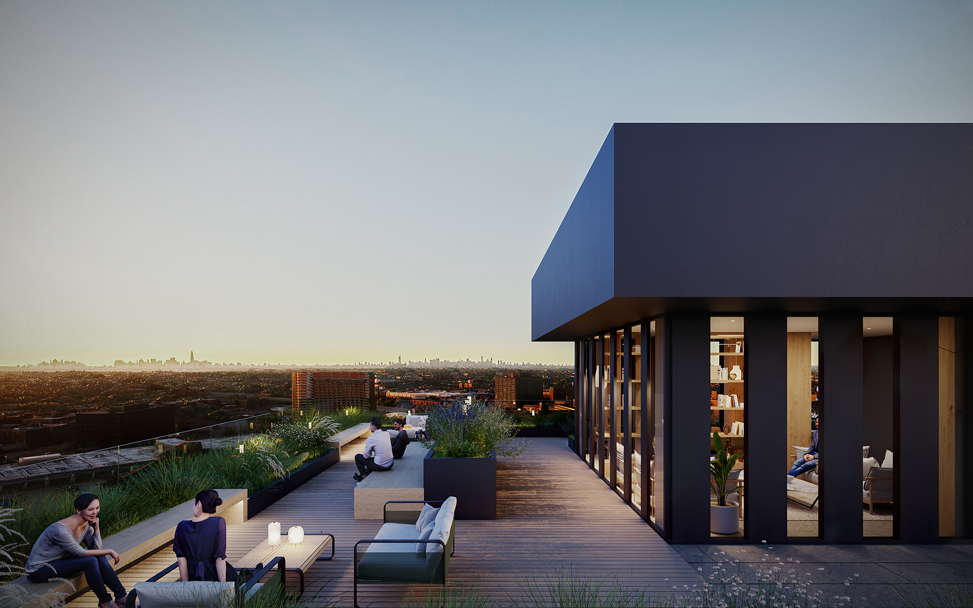 Rooftop terrace at CORE Rego Park on 22nd floor, showcasing resident lounge furniture, greenery & panoramic city views.